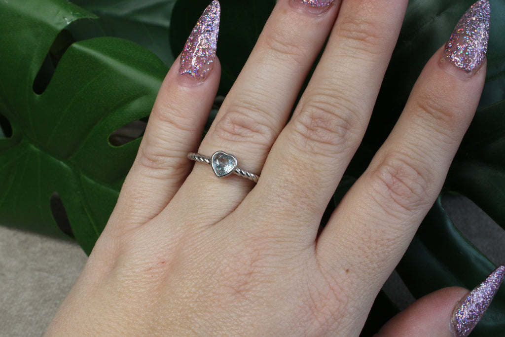 Ring blauwe topaas hartje