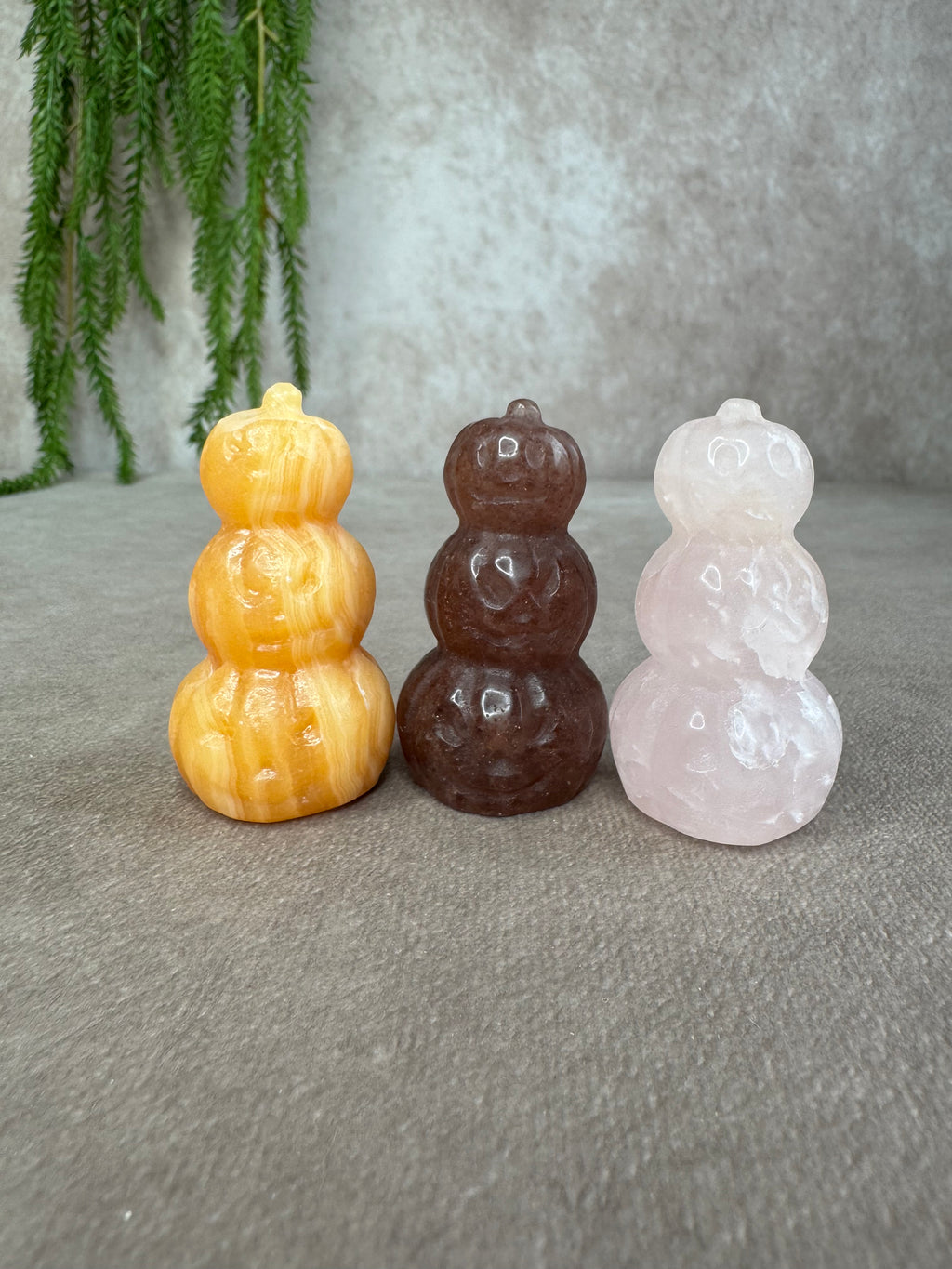 3 pompoenen op elkaar